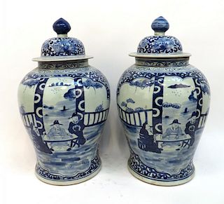 Pair Of Blue & White Lidded Vases