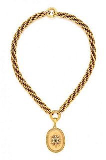 * A Victorian Bicolor Gold Locket and Braided Convertible Chain, 33.80 dwts