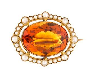 * A Victorian 15 Karat Yellow Gold, Citrine and Seed Pearl Brooch, 2.80 dwts.