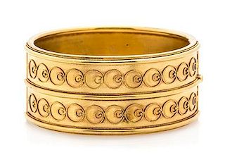 An Etruscan Revival Yellow Gold Bangle Bracelet, 21.90 dwts.