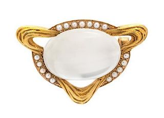 * An Art Nouveau Yellow Gold, Moonstone and Seed Pearl Brooch, 5.35 dwts.
