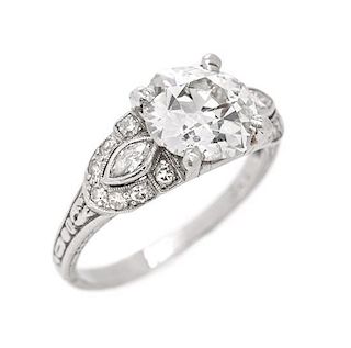 * An Art Deco Platinum and Diamond Ring, 3.00 dwts