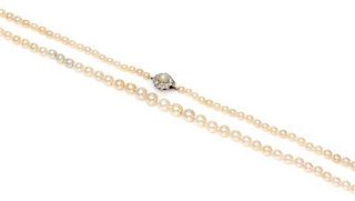 A Graduated Single Strand Natural Pearl Necklace,