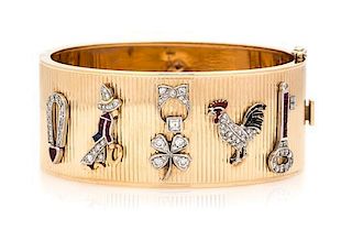 A Retro Yellow Gold Bangle with Attached Art Deco Platinum, Diamond and Multigem Charms, 35.20 dwts.