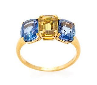 * An 18 Karat Yellow Gold, Sapphire and Yellow Sapphire Ring, Circa 1960, 4.00 dwts.