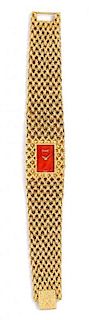 An 18 Karat Yellow Gold and Coral Bracelet Wristwatch, Piaget, 43.30 dwts.