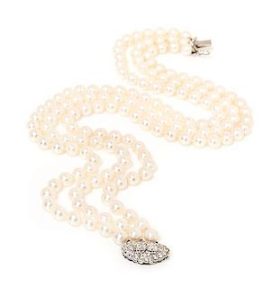 A Multistrand Cultured Pearl, Platinum and Diamond Necklace,