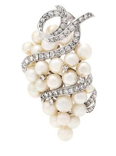 * A White Gold, Cultured Pearl and Diamond Brooch, 13.30 dwts.