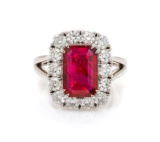 * A Platinum, Diamond and Ruby Ring, 7.10 dwts.