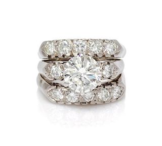 A White Gold and Diamond Ring, 5.50 dwts.