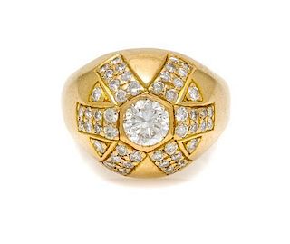 * An 18 Karat Yellow Gold and Diamond Ring, 10.50 dwts.