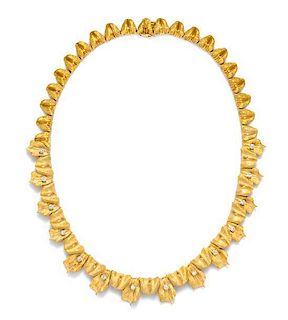* An 18 Karat Yellow Gold and Diamond Leaf Motif Necklace, Spaulding & Co., French, 37.90 dwts.
