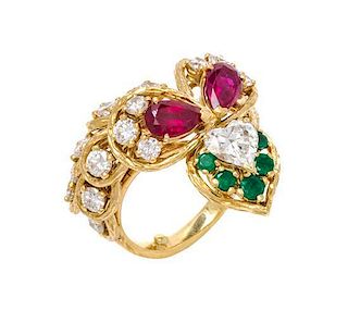 * An 18 Karat Yellow Gold, Diamond, Ruby and Emerald Ring, 8.80 dwts.