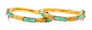 A Pair of High Karat Yellow Gold and Jade Bangle Bracelets, 44.10 dwts.
