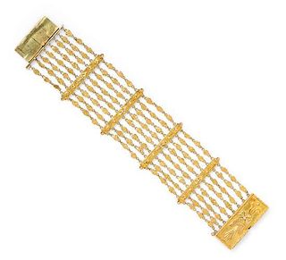 A Tricolor High Karat Gold and Gold Multi Link Bracelet, 37.20 dwts.