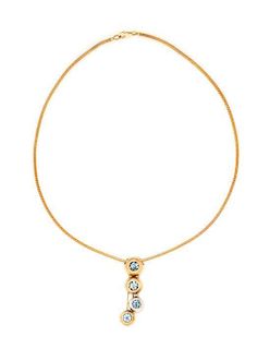 A Bicolor Gold and Aquamarine Pendant, 10.30 dwts.