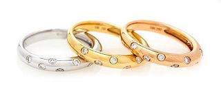 A Collection of 18 Karat Gold and Diamond Stacking Rings, 6.90 dwts.