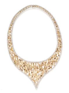 An 18 Karat White Gold, Diamond and Colored Diamond Necklace, 70.70 dwts.