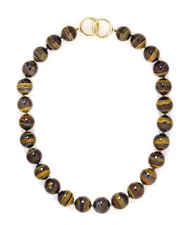 An 18 Karat Yellow Gold and Tiger Iron Bead Necklace, Paloma Picasso for Tiffany & Co., Circa 1983,