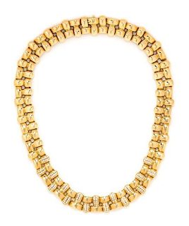 * An 18 Karat Yellow Gold and Diamond Necklace, 89.90 dwts.