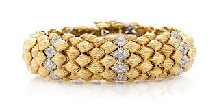* A Bicolor Gold and Diamond Bracelet, 47.00 dwts.