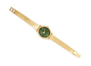 * An 18 Karat Yellow Gold and Hardstone Wristwatch, Piaget, 23.60 dwts.