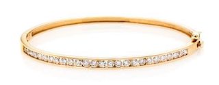 A 14 Karat Rose Gold and Diamond Bangle Bracelet, 8.30 dwts.