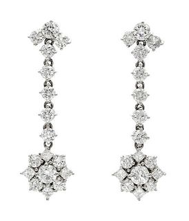 A Pair of White Gold and Diamond Pendant Earrings, 12.10 dwts.