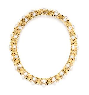 * An 18 Karat Yellow Gold, Pearl and Diamond Collar Necklace, 109.00 dwts.
