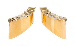 * A Pair of 18 Karat Bicolor gold and Diamond Earclips, 21.60 dwts.