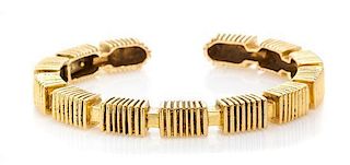 * An 18 Karat Yellow Gold Textured Cuff Bracelet, 28.50 dwts.