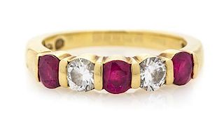 * An 18 Karat Yellow Gold, Ruby and Diamond Band Ring, Tiffany & Co., 2.90 dwts.
