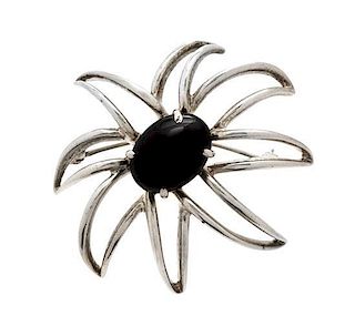* A Sterling Silver and Onyx Starburst Brooch, Tiffany & Co., 11.10 dwts.