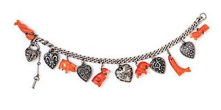 An Antique Sterling Silver and Carved Coral Charm Bracelet, 19.20 dwts.