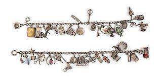 A Pair of Vintage Sterling Silver Charm Bracelet with Numerous Attached Articulated Charms, 36.80 dwts.