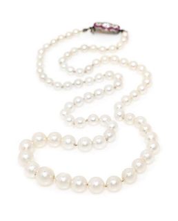 * A Vintage Single Strand Pearl Necklace with a Ruby and Diamond Clasp,