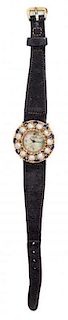 A 14 Karat Yellow Gold, Cultured Pearl, Sapphire and Mother-of-Pearl Wristwatch, Lucien Piccard,