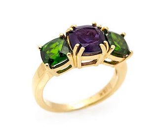 An 18 Karat Yellow Gold, Iolite and Chrome Diopside Ring, 3.90 dwts.