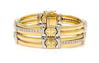 * An 18 Karat Bicolor Gold and Diamond Bracelet, 36.50 dwts.