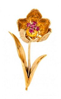 * An 18 Karat Yellow Gold and Ruby Articulated Flower Brooch, French, 10.30 dwts.