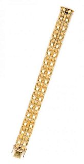 * A 14 Karat Yellow Gold Link Bracelet, 27.90 dwts.