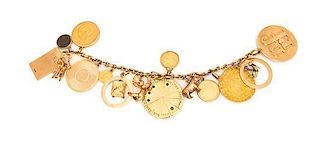* A Yellow Gold Bracelet with 15 Attached Charms, 97.10 dwts.