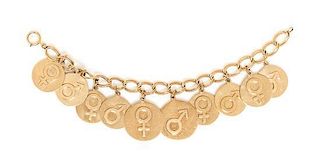 A 14 Karat Yellow Gold Charm Bracelet with 10 Attached Charms, 42.50 dwts.