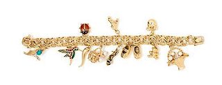 A 14 Karat Charm Bracelet with 12 Attached Charms, 41.50 dwts.