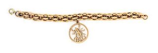 A Yellow Gold Bracelet with Attached Scorpio Charm, 21.30 dwts.