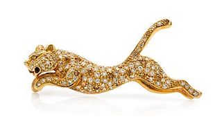 * An 18 Karat Yellow Gold, Diamond and Fancy Colored Diamond Panther Brooch, 7.50 dwts.