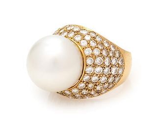 * An 18 Karat Yellow Gold, Cultured South Sea Pearl and Diamond Ring, 7.40 dwts.