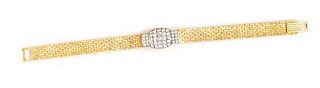 An 18 Karat Yellow Gold and Diamond Surprise Watch, Audemars Piguet, 18.60 dwts.