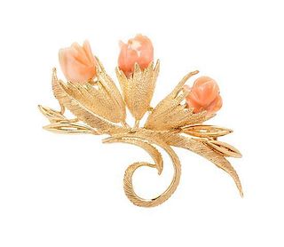 A 14 Karat Yellow Gold and Coral Floral Motif Brooch, 10.00 dwts.