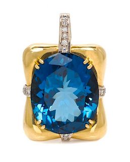 * An 18 Karat Bicolor Gold, Blue Topaz and Diamond Pendant, Hauer, 24.00 dwts.